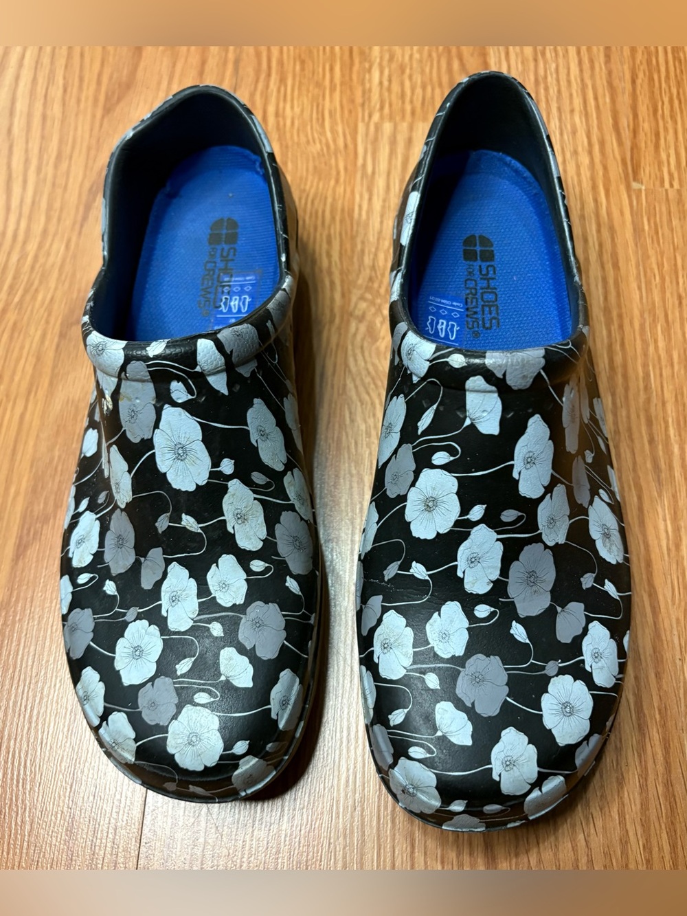 Shoes For Crews Black Floral Slip-On Clogs with Blue Insoles